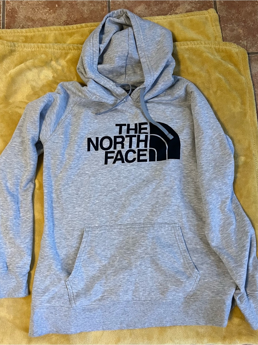The North Face Light Gray Women's Hoodie with Black Logo